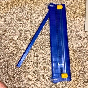 Paper cutter with dual cutters.